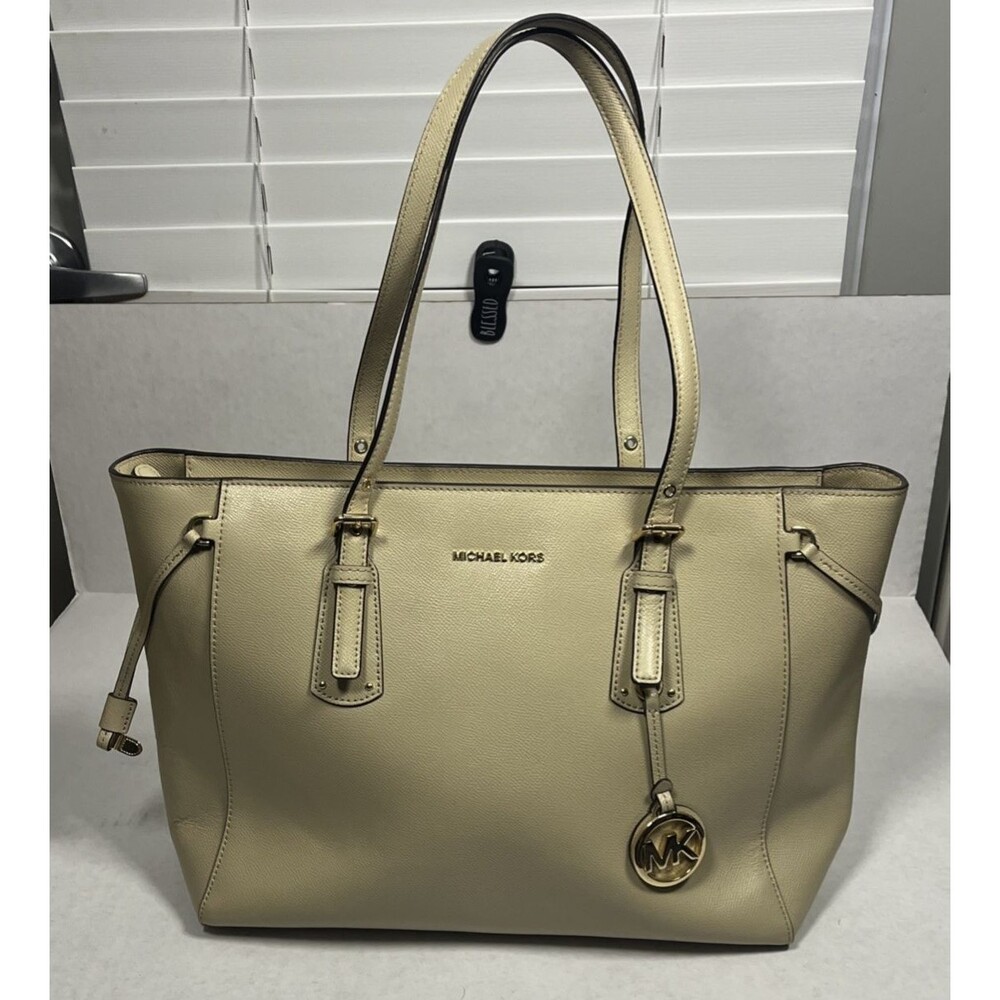 Michael Kors Jet Set Travel Large Beige Leather Tote Good cond Ink Marks inside